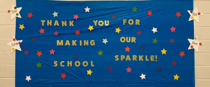 A banner reading thank you for making our school sparkle