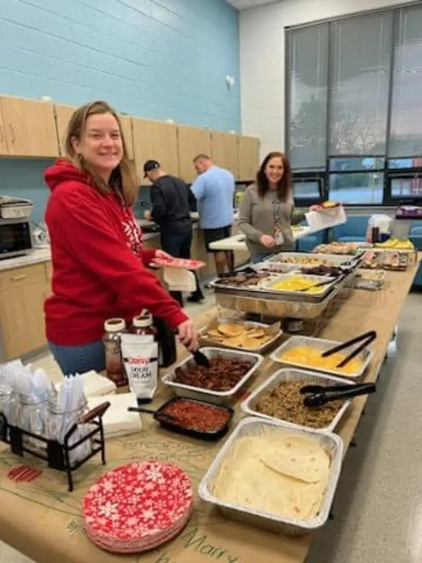 Volunteers setting out a hot breakfast for Edgewater staff